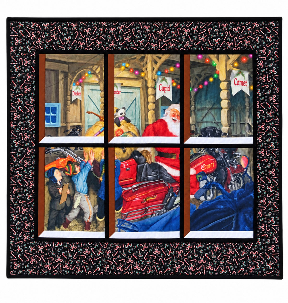 Quilted window-style wall hanging depicting Santa on a motorcycle named Comet with elves packing it with toys beneath colorful Christmas lights, framed by a black border with candy canes